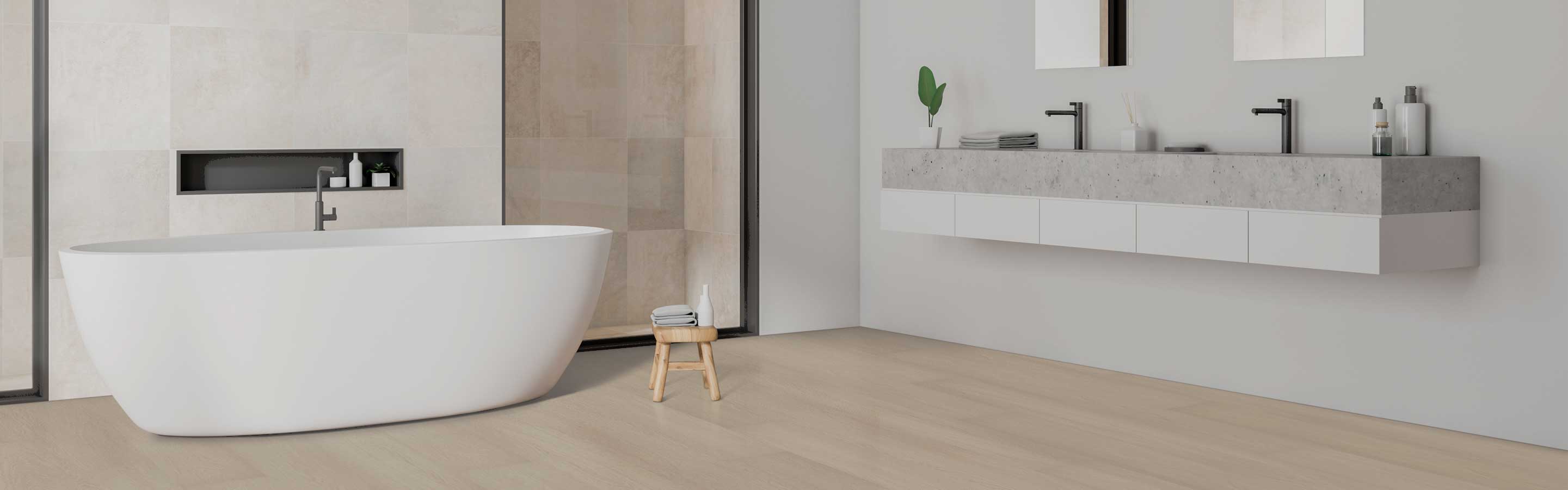 water resistant floors in bathroom with white soaker tub and large format tile squares in shower